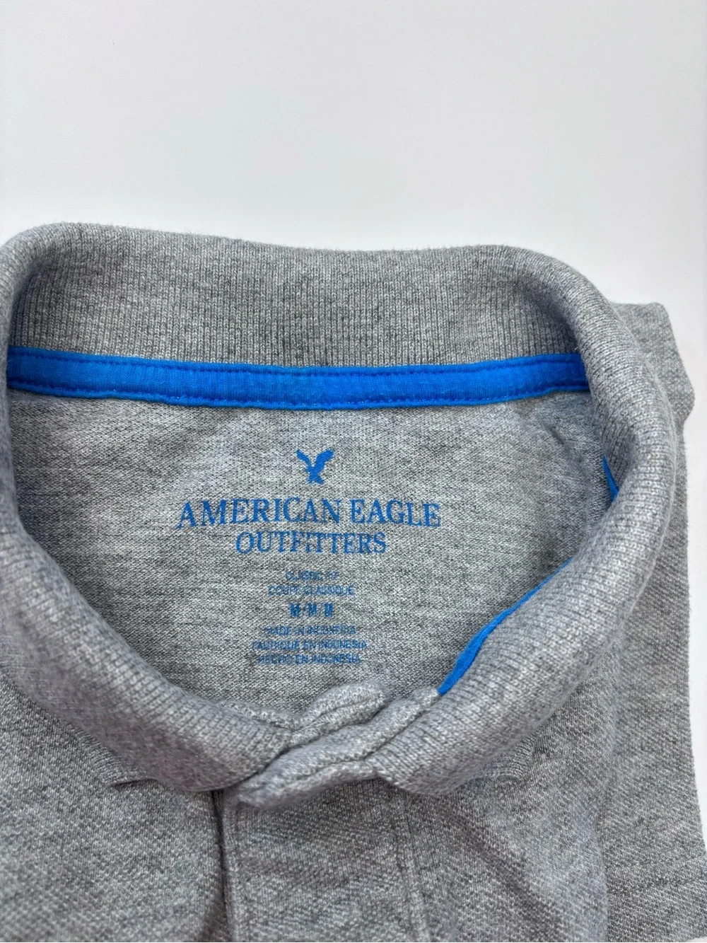 American Eagle Outfitters Classic Fit Heathered Grey Polo with Blue Logo Trim M
